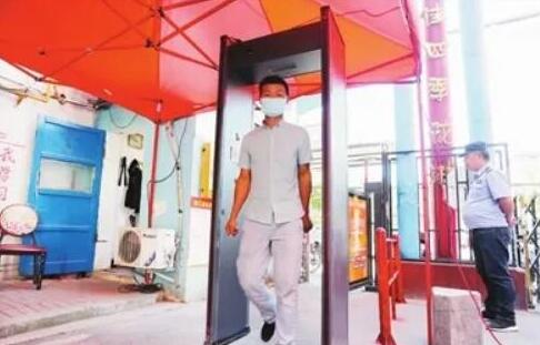 ?智能測溫安檢門來了 居民進(jìn)出更安心