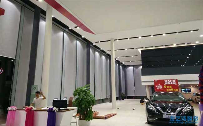 東莞長安東風(fēng)4S店展廳超高電動(dòng)窗簾案例 - 中出網(wǎng)-智能出入口與停車充電門戶